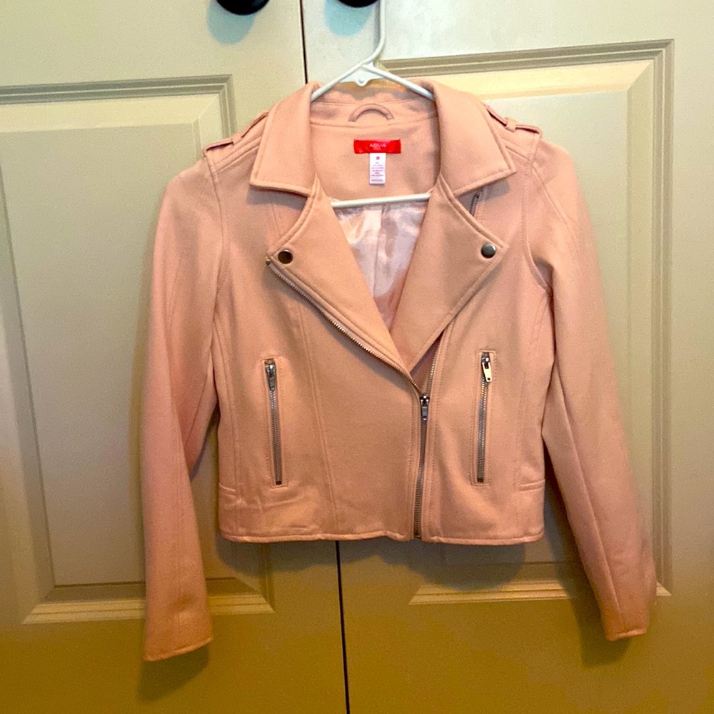 Light pink stylish motto jacket in a new-like condition.